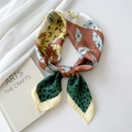 Green leopard print and red floral silk scarf for women in a knotted display - Leaf Leopard Green