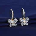 Golden butterfly drop earrings with sparkling white zircons on dark blue fabric - A Pair Of Gold Leds-160