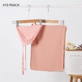 Detailed set of peach modal hijab and matching chiffon shawl on a wooden hanger - No.10 (Peach)
