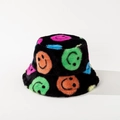Colorful smiley face plush bucket hat in black faux fur for winter outdoor wear - Black Multi-color Print