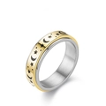 Macro view of gold spinner ring with star and moon engraving on rotating band - US 5 / Two-tone Dotted Moon Star Rotating Ring