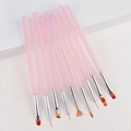 Primo piano di 10 pennelli per nail art sfumati rosa con punte varie su gradini bianchi - Set da 9 pezzi / Rosa Aurora (Set da 9)