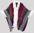 Bohemian knit poncho with colorful wave patterns and white faux fur trim in red and blue - Rose Red
