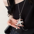 Silver starfish pendant necklace with heart tassel on woman in black top - Silver Starfish Heart (13# Necklace)