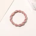 Detail of pink three-strand braided elastic hair tie with matching cylindrical bead - Braided Twist - Plastic Buckle / Pink