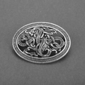Close-up of vintage silver Viking brooch featuring intricate Celtic knotwork and Nordic shield - D-178 Antique Silver Oval Hollow Ethnic Dragon Totem