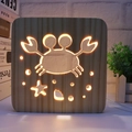 3D hollow carved pine wood night light featuring a crab pattern and warm LED glow - Crab/15cm
