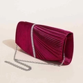 Detailed view of burgundy velvet pleated evening clutch with vertical rhinestone trim and chain - Burgundy