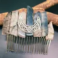 Detailed view of handmade Bohemian hair comb with raw crystals and silver moon charm - Black Rutilated Quartz + Moon