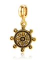 Macro detail of antique gold ship wheel charm with metallic texture and vintage finish - Gold Vintage Ship Wheel