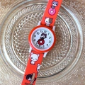 Detail of soft orange silicone watch strap featuring cute cartoon cat and donut prints - Red