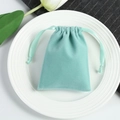 Mint green velvet drawstring pouch for jewelry storage displayed on a white plate - 5*7cm / Mint Green