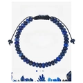 Detailed view of blue lapis lazuli beaded bracelet on an educational gift card - Lapis Lazuli