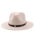 Detail of light pink straw cowboy hat featuring black leather band with silver star studs - Pink