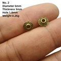 Detalle de cuentas espaciadoras de bronce antiguo de 6mm con puntos para joyas DIY - Cuenta Texturizada No. 2 (6mm Diámetro/3mm Espesor)