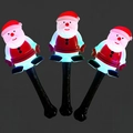 Three glowing Santa Claus wands with blue LED lights for Christmas festive decoration - Santa Claus Glow Stick