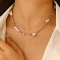 Elegant baroque pearl necklace with silver metal chain on model for women - Silver Wave Chain Pearl Necklace (5934)