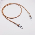 Close-up of 6mm khaki leather bag strap featuring durable silver metal swivel snap hooks - Khaki + Silver Hook