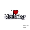 Detailed view of enamel brooch measuring 4.3x1.9cm with I Love Microbiology text - Microbiology Style