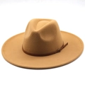 Detail of camel wool fedora with broad brim and brown leather band with golden buckle - Camel