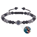 Detail of custom photo projection bead on matte black and marble stone braided bracelet - Map Stone and Frosted Stone Bracelet