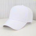Classic white cotton baseball cap with curved brim shown in minimalist studio setting - Adjustable / White