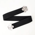 Women's black elastic waist belt with decorative silver floral metal buckles - Black