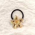 Minimalist elastic hair tie with a shiny gold five-petal metal flower ornament - Gold Flower