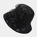 Detailed close-up of the black organza sun hat featuring lace mesh and a large floral accent - Black