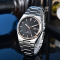 Detail of mechanical watch with black waffle dial, rose gold bezel and calendar window - 4-Silver Case Black Dial Gold Bezel
