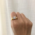 Gold-plated 18K titanium ring with a round clear gemstone and a ribbed spiral band - US 9 / White Zircon