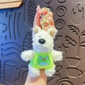 Cute white plush Westie puppy keychain with a green frog vest and golden clasp - Frog