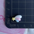 Detailed view of a 1.8cm mini colorful resin star with wings for DIY phone case crafts - Yellow Pentagram Rainbow
