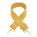 Dettaglio della tracolla tessuta con motivo a greca giallo e bianco e ganci oro - Fibbia Oro / Giallo