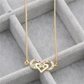 Detail of gold-plated necklace featuring a heart and infinity pendant with colorful zircons - Heart Infinity Necklace