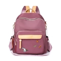 Zaino color-block viola e kaki con ricami a cartoni e tessuto impermeabile - Rosa