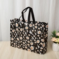 Laminated non-woven shopping bag featuring daisy print and reinforced black handles - 36*47*10cm / Black Daisy