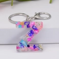 Colorful resin letter Z keychain featuring vibrant crushed stones and silver metal ring - Letter Z