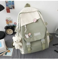 Detail of fashion nylon backpack in beige and green patchwork with cute charms and pins - Single Bag / Sage Green and Beige Patchwork