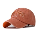 Close-up of New York embroidery on washed cotton baseball cap with distressed texture - Adjustable / Orange