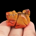Handheld red and yellow jasper squirrel crystal animal carving with black veins - Colored Jade