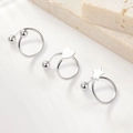Detail of 925 sterling silver ball, heart, and star studs with polished metallic luster - White Gold Color-Set of 3 (Single-Left Ear)