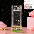 Panda liquid motion timer with green fluid and glitter in a 16.2cm acrylic frame - Panda Slide Ornament - Green Liquid