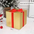 30cm Matte Gold Christmas gift box with red ribbon bow for festive window display - 30cm Matte Gold Gift Box