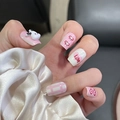Detailed view of handmade press-on nails with 3D bunny, heart patterns, and red LOVE text - By1644 / Glue Type