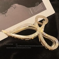 Detail of a large butterfly hair claw with cream acetate and sparkling rhinestone edge - 11.5CM / Mermaid White