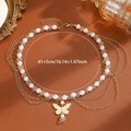 Multi-layer gold chain necklace with white pearls and a delicate butterfly pendant - Style 11 Gold Necklace