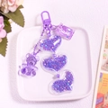 Detail of purple acrylic bear keychain with glitter heart charms and sweet candy pendant - Purple (yc5293-5)