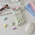 Detailed shot of quilted cotton glasses case with lace trim and heart button closure - Salt Style Bunny