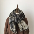 Thick black and white plaid scarf with tassels on a mannequin for autumn and winter - Double Sided Black Rice